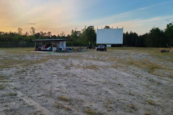Some Drive-Ins Show Movies, but North Carolina’s Stateline Movie Time in Tabor City Adds a Flea Market, Bonfires, and Camping Too