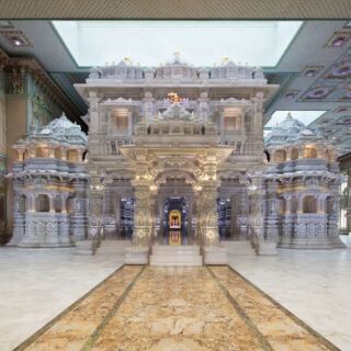 This Robbinsville, New Jersey Temple Lets You Walk Among Remarkable Stone Carvings