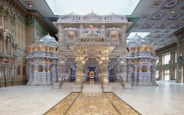 This Robbinsville, New Jersey Temple Lets You Walk Among Remarkable Stone Carvings