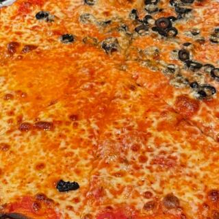 15 Hole-In-The-Wall Pizza Joints Across America Worth the Road Trip