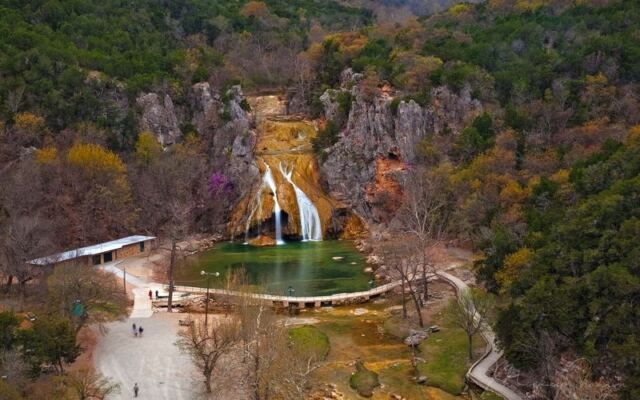Just Off I-35 in Davis, Turner Falls Pairs a 77-Foot Waterfall With Stone Castle Ruins