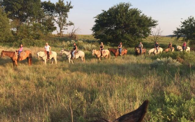 Saddle Up at This Ranch Outside Fay, Oklahoma, Where You Ride Right Past Grazing Cows and End With a Campfire Dinner