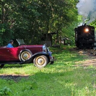 This 1912 Illinois Steam Train Burns Firewood Instead Of Coal On Its Ride Through The Woods