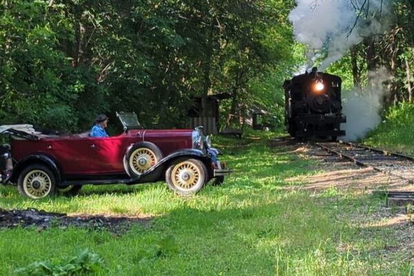 This 1912 Illinois Steam Train Burns Firewood Instead Of Coal On Its Ride Through The Woods