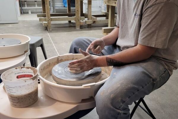 First-Timers Shape Their Own Clay Mugs On The Wheel At This Small Illinois Pottery Studio