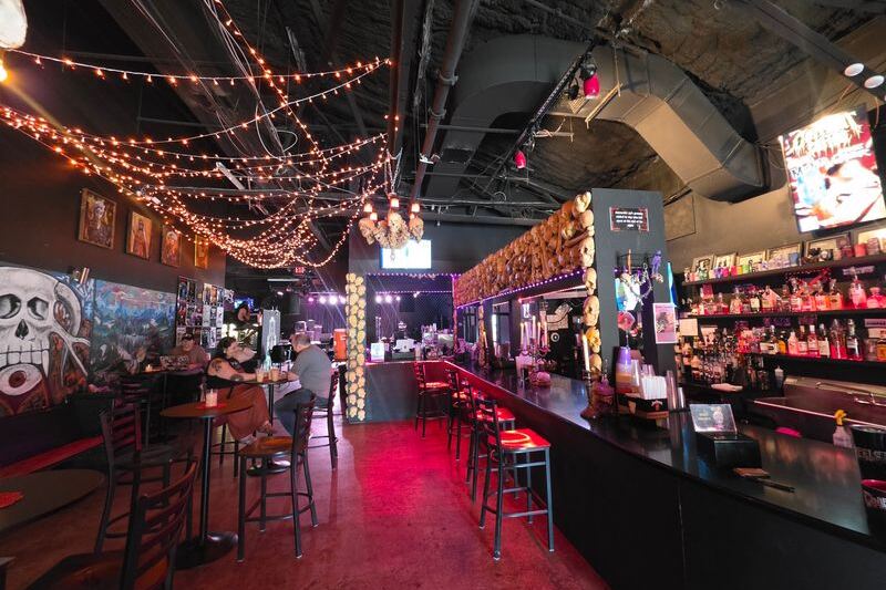 This Moody North Carolina Coffee Shop Serves Your Latte Surrounded by Velvet and Black Victorian Walls