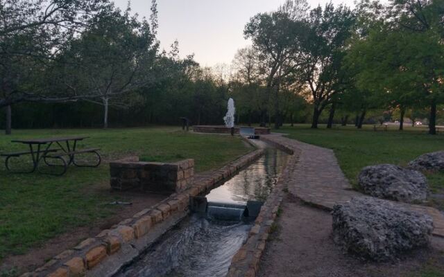 Fill Your Jugs for Free at the Artesian Well Flowing in Sulphur, Oklahoma Since the 1900s