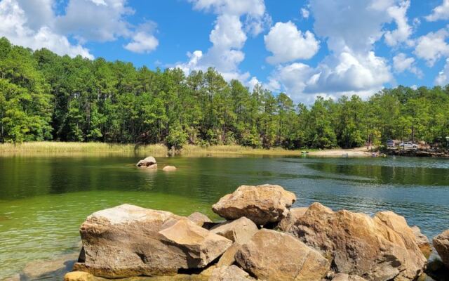 Tucked in the Texas Pines, This Old Quarry Lagoon Lets You Float All Day at Your Own Picnic Site