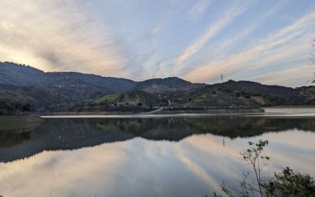This Man-Made California Reservoir Allows Only Non-Motorized Boats, and Its Glassy Morning Water Keeps Paddlers and Anglers Coming Back