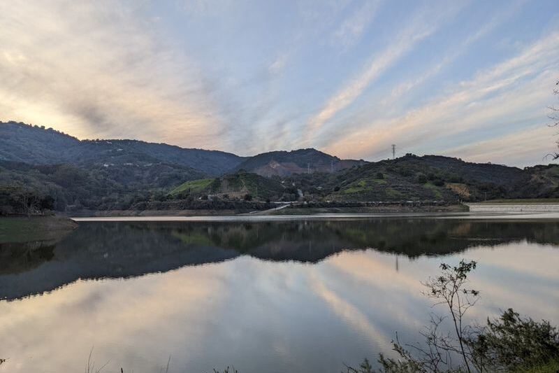 This Man-Made California Reservoir Allows Only Non-Motorized Boats, and Its Glassy Morning Water Keeps Paddlers and Anglers Coming Back
