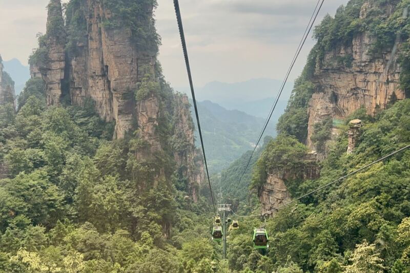 One of China’s Most Otherworldly Landscapes Is Filled With Stone Towers Rising Above the Forest