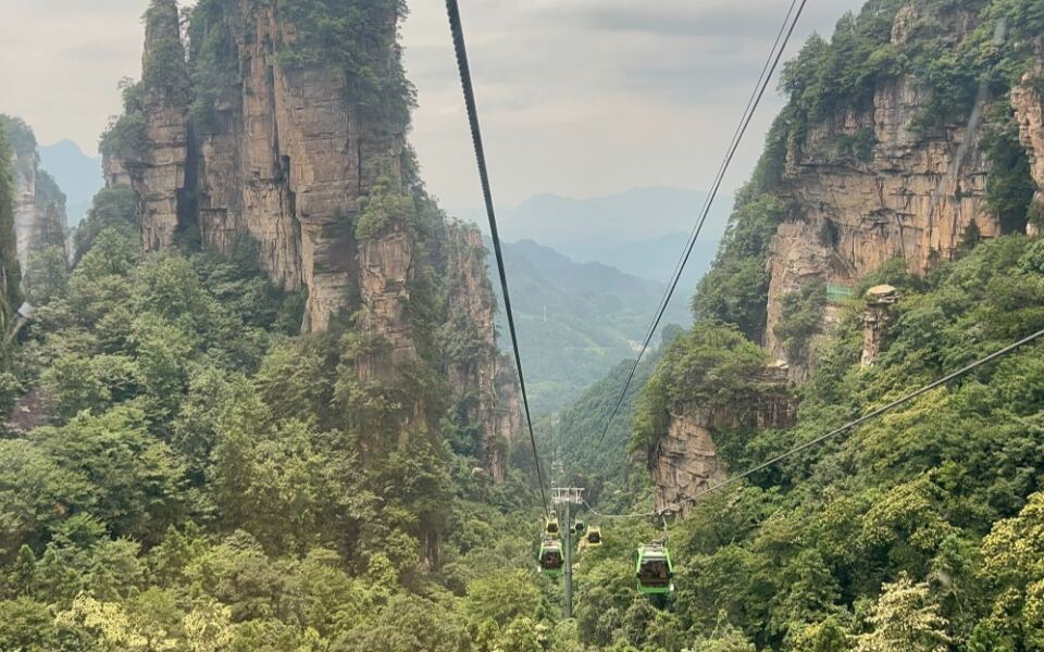 One of China’s Most Otherworldly Landscapes Is Filled With Stone Towers Rising Above the Forest