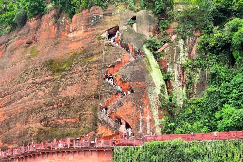 The Incredible Cliffside Trail That Winds Past a Giant Buddha