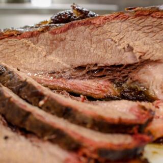 13 Guy Fieri-Approved BBQ Stops Serving Serious Smoke and Flavor