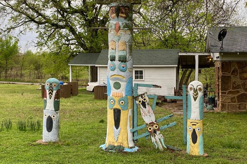 Totem Poles Painted Like Folk Art Rise From the Woods at Ed Galloway’s Park in Foyil