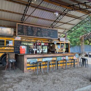 This Quirky Tennessee Spot Dishes Out Cheesesteaks and Burgers From Inside a Converted Old Bus