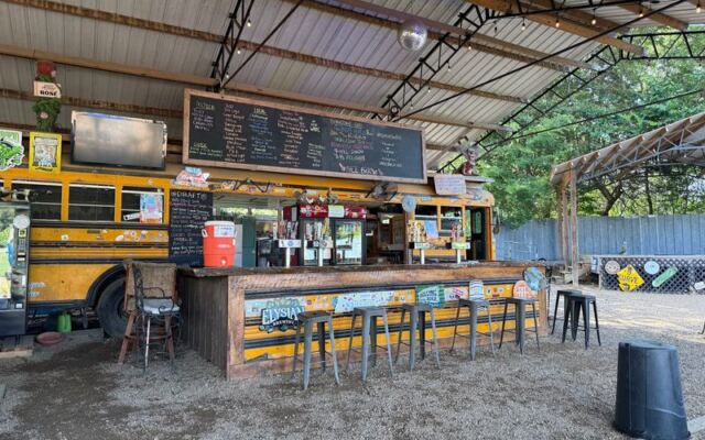 This Quirky Tennessee Spot Dishes Out Cheesesteaks and Burgers From Inside a Converted Old Bus