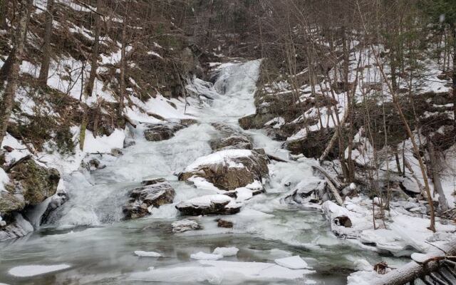 An Easy Mile-Long Gravel Path in Western Massachusetts Ends at a 60-Foot Hidden Waterfall