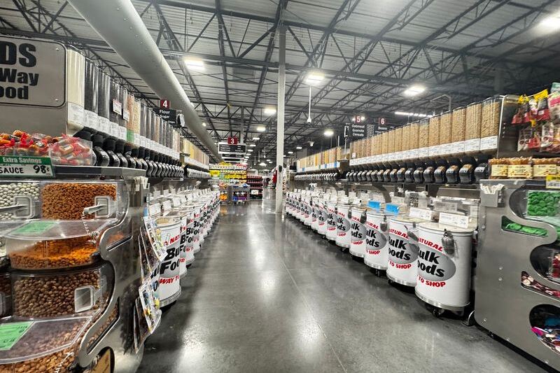 Shoppers Scoop Trail Mix From Huge Bulk Bins at This Texas Discount Supermarket That Beats Walmart Prices