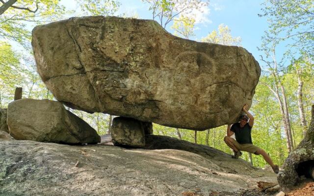 Hike Pyramid Mountain in Boonton, New Jersey, to Tripod Rock, a glacial boulder balanced on three smaller stones