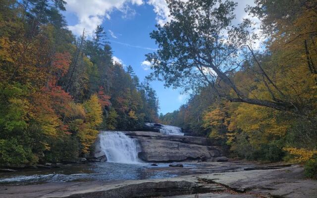 This Short North Carolina Trail Leads to Three Waterfalls Wrapped in Peak Fall Color