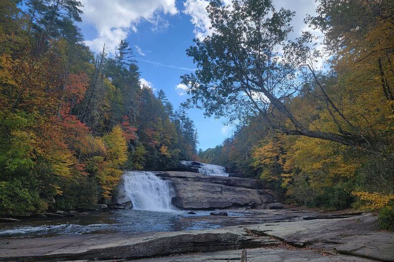 This Short North Carolina Trail Leads to Three Waterfalls Wrapped in Peak Fall Color