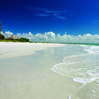 Seashells Wash Up Beneath a Historic Lighthouse on This Turquoise Florida Beach Most Tourists Skip