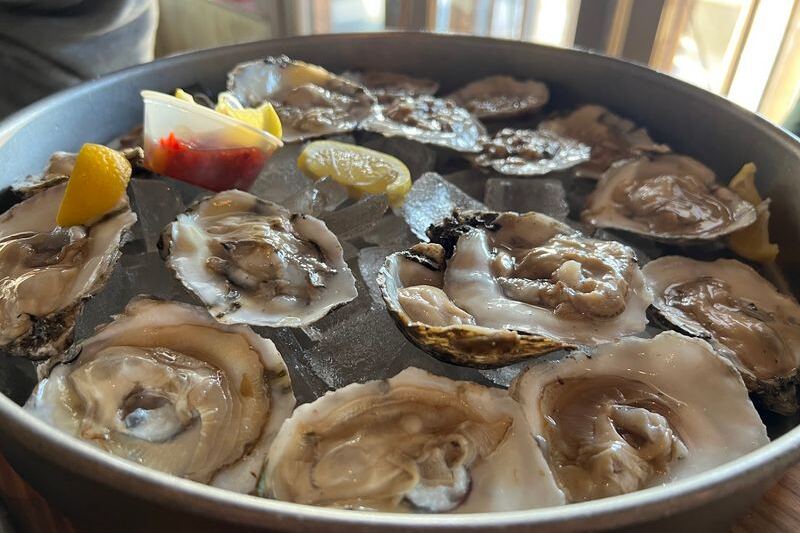 Oyster Season Is Here, and This No-Frills Carolina Beach Bar Is Where North Carolina Locals Pile In for $1.50 Oysters