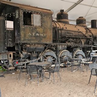 Pouring Drinks Since 1899, This Quirky New Mexico Roadhouse Keeps a Train Out Back
