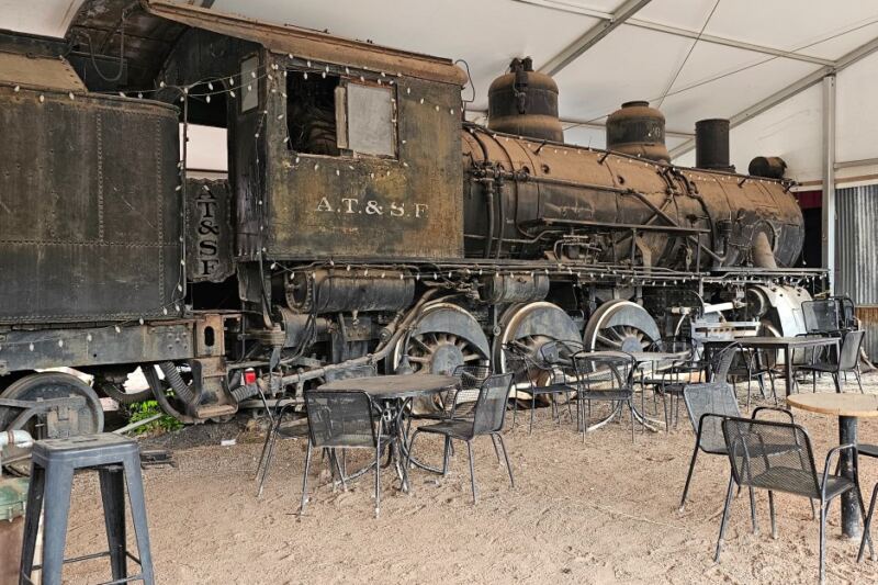 Pouring Drinks Since 1899, This Quirky New Mexico Roadhouse Keeps a Train Out Back