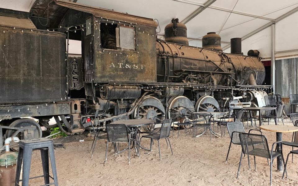 Pouring Drinks Since 1899, This Quirky New Mexico Roadhouse Keeps a Train Out Back