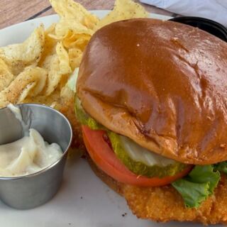 Grab a Pork Tenderloin Sandwich at This Indiana Canal-Side Patio Bar With Live Music on Summer Thursdays