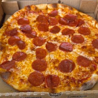 Locals Build Whole Drives Around the Pizza at This Tiny Seaside Massachusetts Village Spot