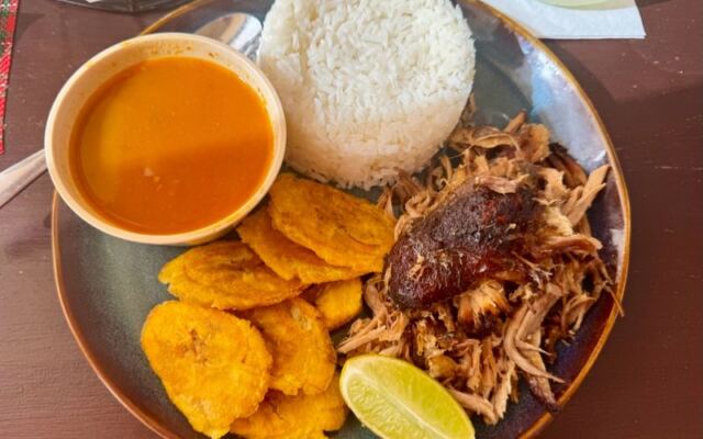 Nobody Leaves Hungry From This Charlotte Dominican Kitchen Where Plates of Pollo Guisado Need Two Hands