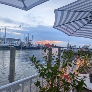 Watch Fishing Boats Cruise Past Your Window While You Eat Seafood in Point Pleasant Beach, New Jersey