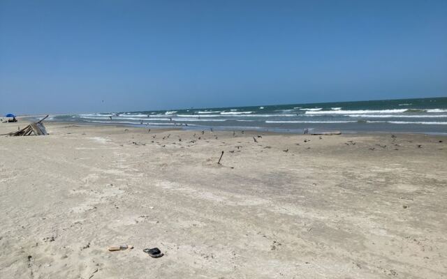 A Five-Minute Boat Ride Takes You to a Quiet Texas Island Beach With No Amenities in Sight