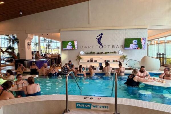 This Adults-Only Minnesota Soaking Pool Has a Swim-Up Bar Spot Where Grown-Ups Float All Afternoon