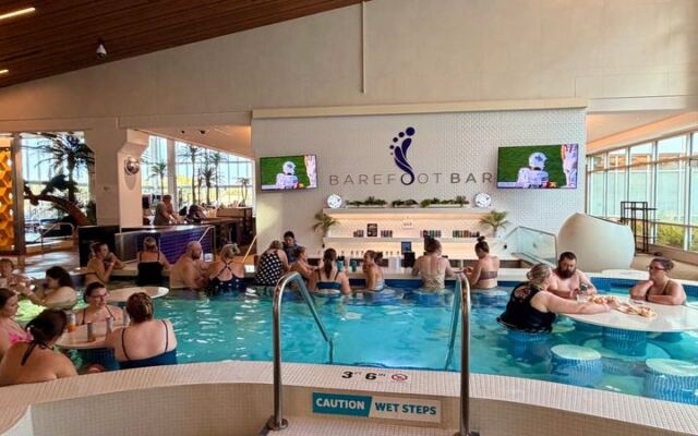 This Adults-Only Minnesota Soaking Pool Has a Swim-Up Bar Spot Where Grown-Ups Float All Afternoon