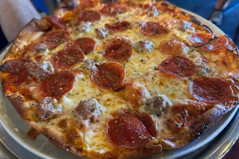 Illinois Locals Have Sworn By This Historic Thin-Crust Pizzeria For Generations