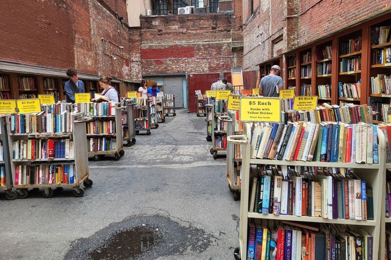 Book Lovers Lose Whole Afternoons in These 9 Massachusetts Used Bookstores Stacked to the Ceiling