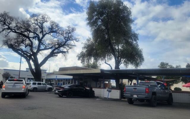 This Decades-Old Carhop Drive-In in California Still Brings the Burgers Right to Your Car
