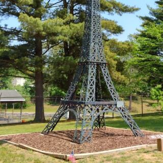 This Tiny Michigan Town Has Its Own Eiffel Tower Made From Old Bed Frames
