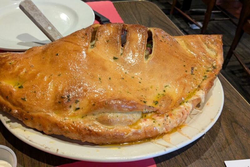 This Hidden Pittsburgh Restaurant Serves a Calzone Nearly as Wide as the Table