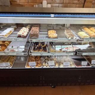 For Over A Century, This Illinois Pastry Counter Has Been Filling Cannoli By Hand