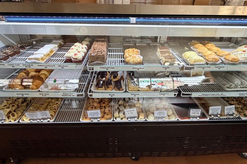 For Over A Century, This Illinois Pastry Counter Has Been Filling Cannoli By Hand