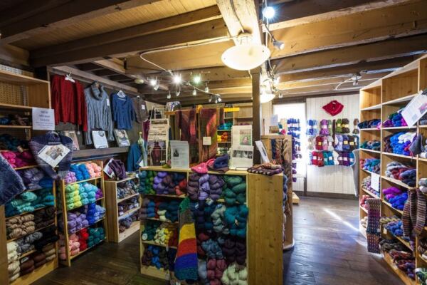 This Family-Owned Ohio Yarn Shop Stacks Skeins So High Every Knitter Finds Their Color