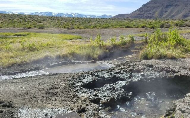 At Mickey Hot Springs, Oregon’s Remote High Desert Hides a Tiny Geyser and Steaming Pools
