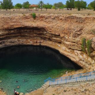 This Deep Blue Pool Feels Completely Out of Place in Oman’s Dry Landscape
