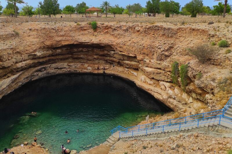This Deep Blue Pool Feels Completely Out of Place in Oman’s Dry Landscape