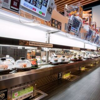 Dinner Arrives by Conveyor Belt at Kura in Jersey City, New Jersey